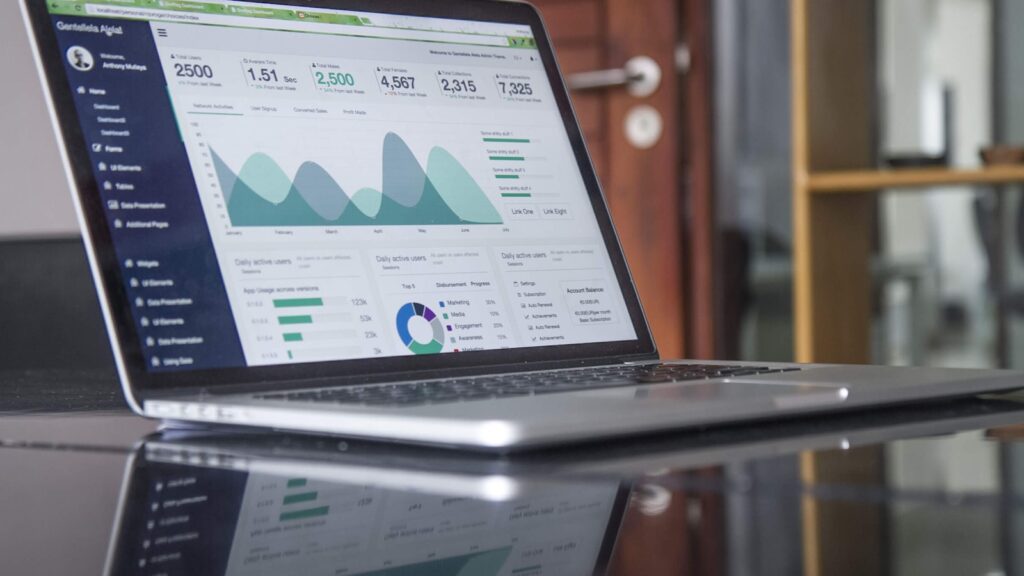 Business analytics displayed on a laptop